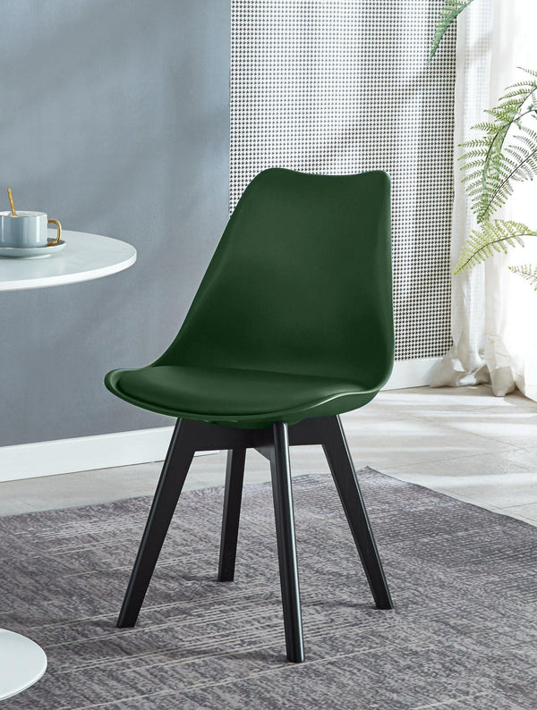 Juego de 4 sillas escandinavas de madera y polipropileno verde