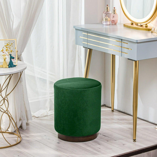 Puff de terciopelo verde con base en madera