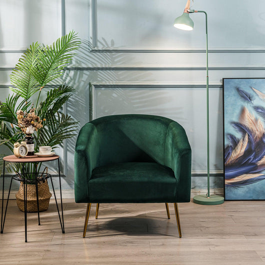 Sillón de metal y terciopelo verde